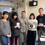 旭川商業高校の松村順先生と情報処理科2年生の小川桃さん